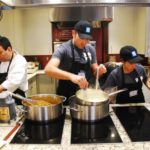 Staff preparing fondue